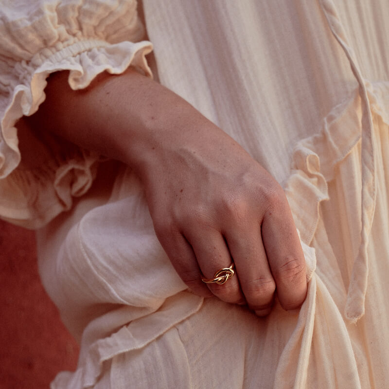 Anel Knot em Prata Dourada