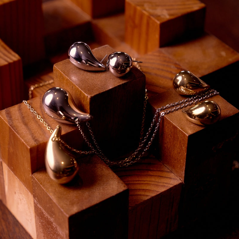 Brincos Teardrop em Aço Dourado