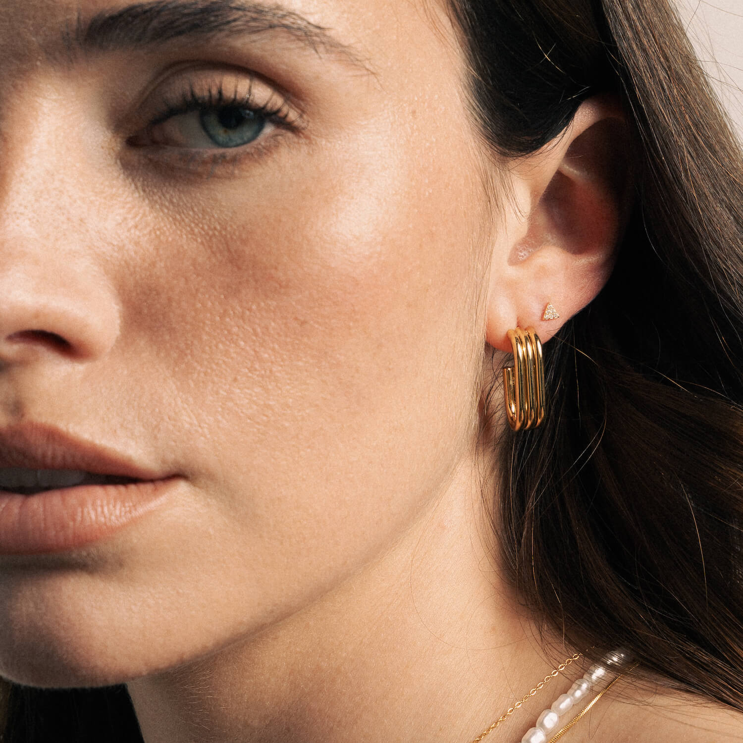 Brincos Argolas em Aço Dourado