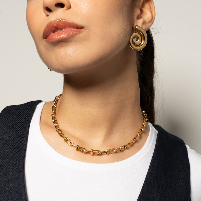 Brincos em Aço Dourado