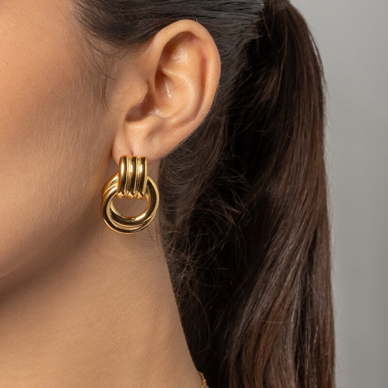 Brincos em Aço Dourado