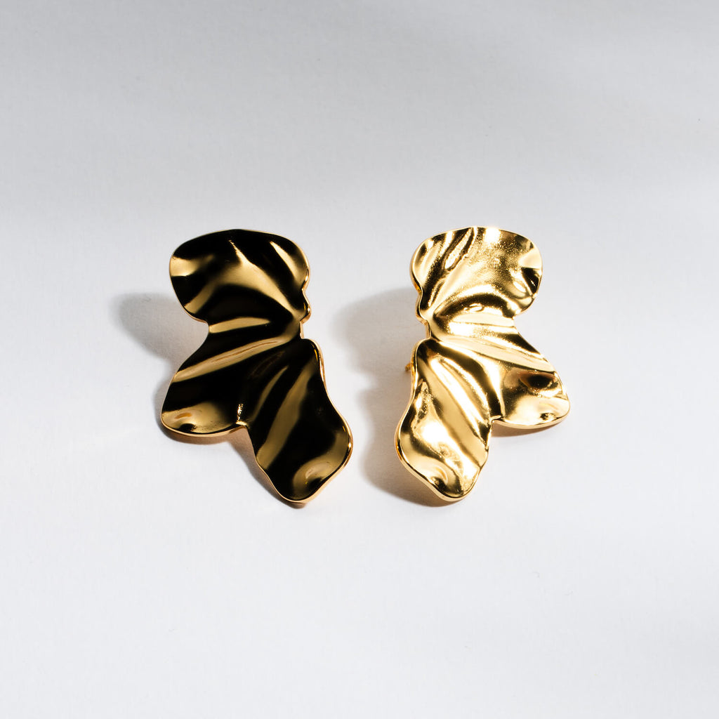 Brincos em Aço Dourado