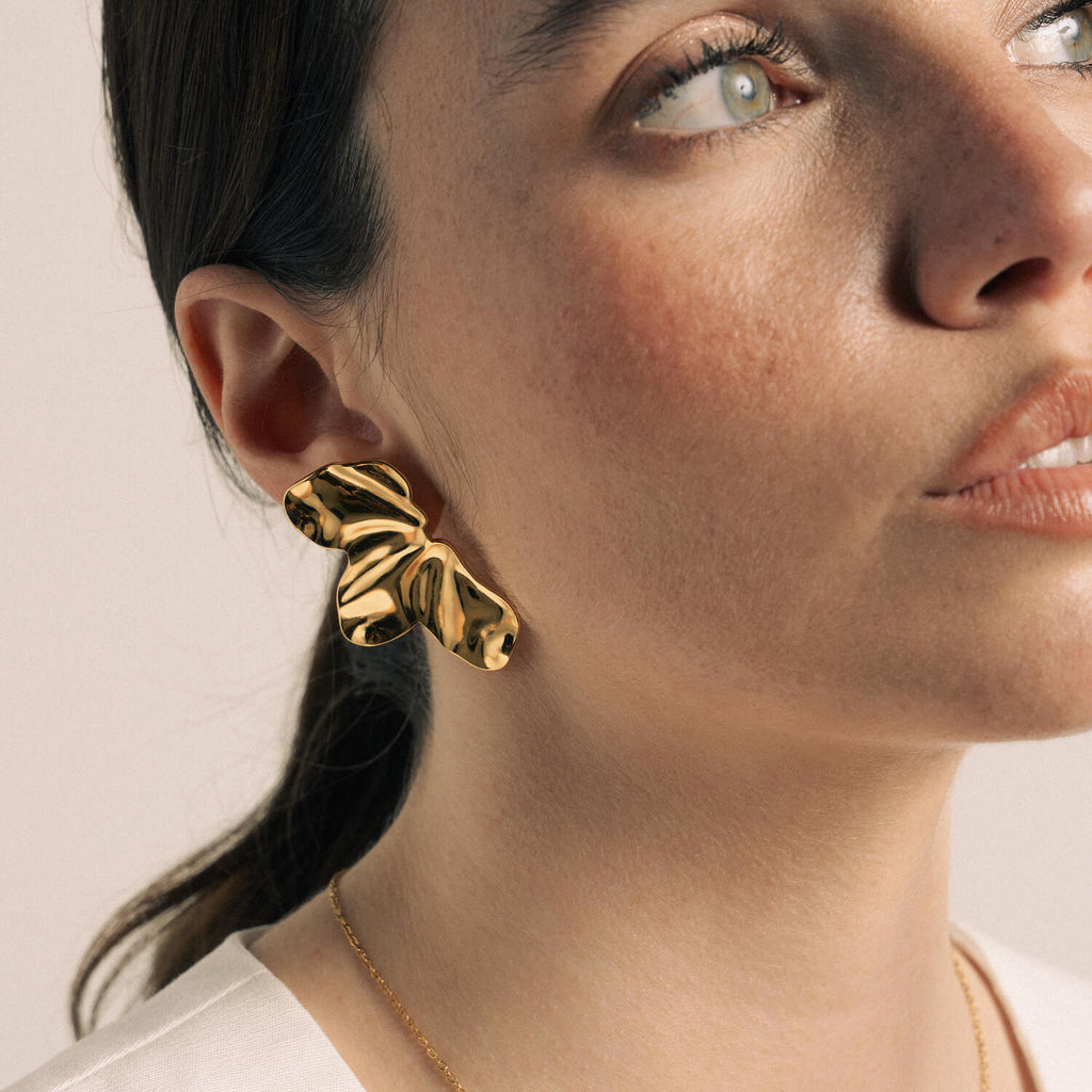 Brincos em Aço Dourado