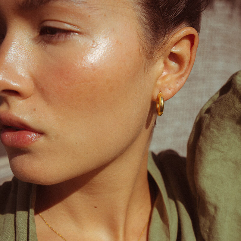 Brincos Argola média perfil redondo dourados