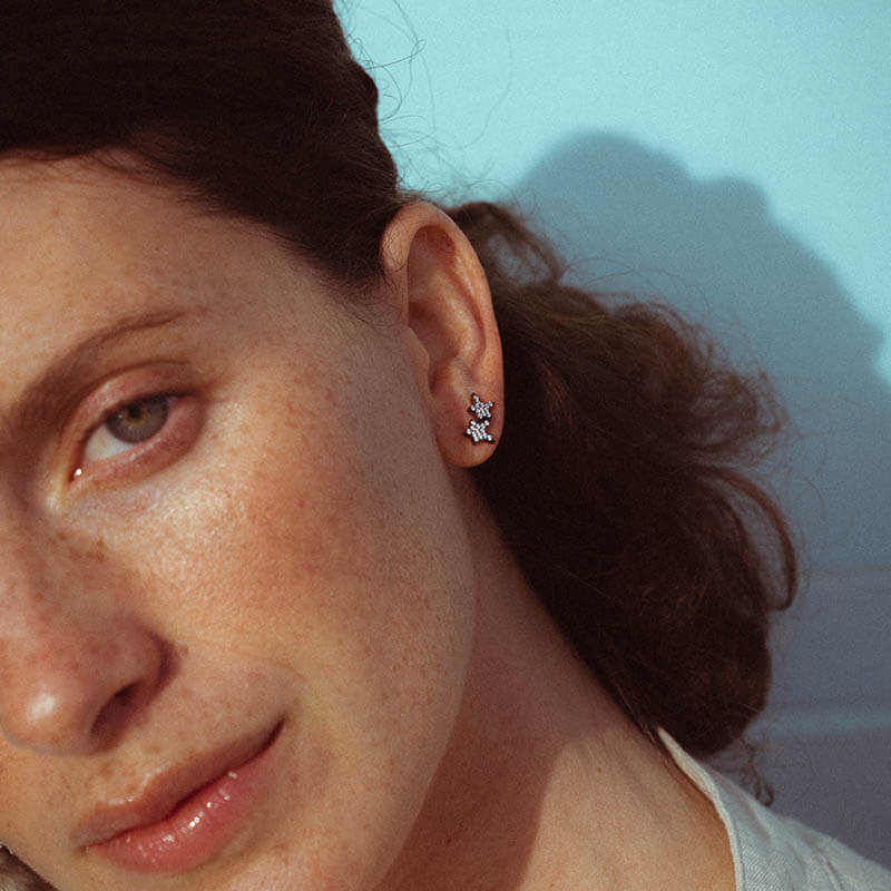 Brincos estrela brilhantes oxidados