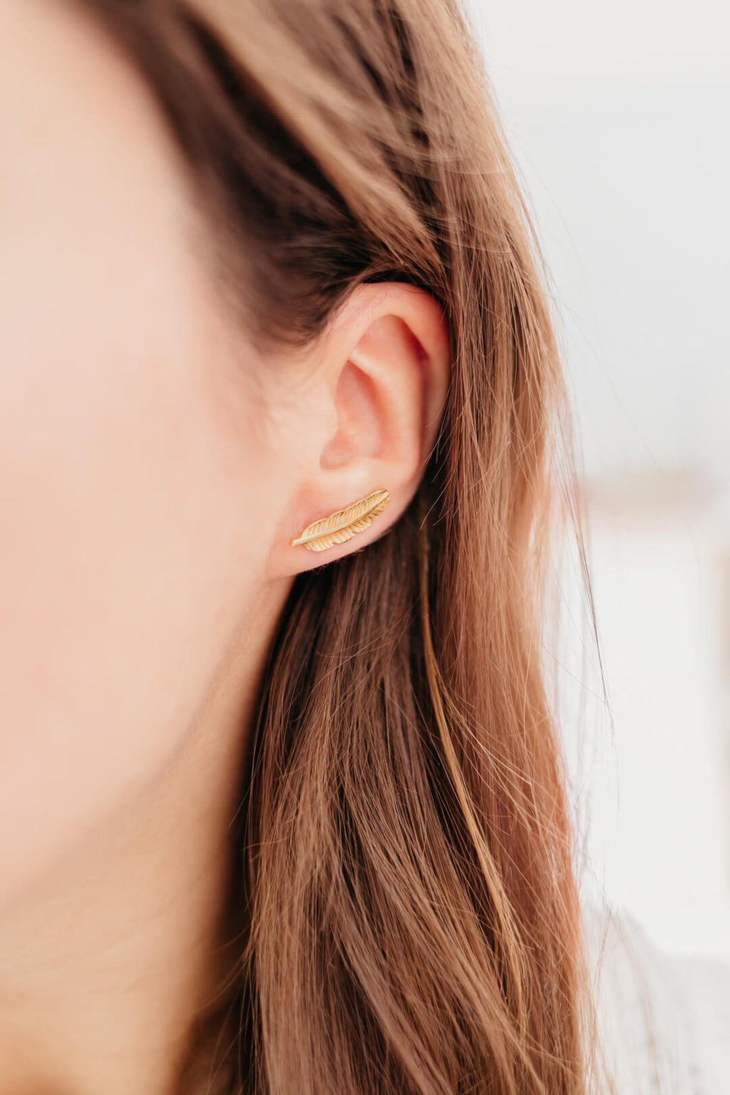 Brincos Pena grandes dourados