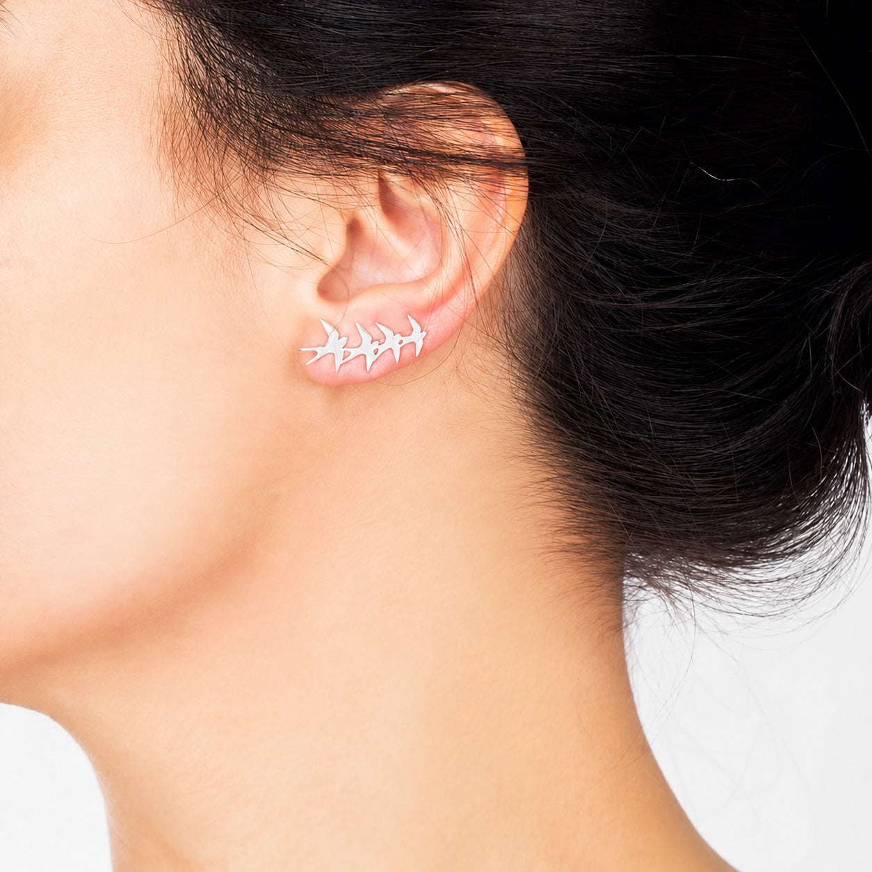 Silver asymmetric Swallow earrings