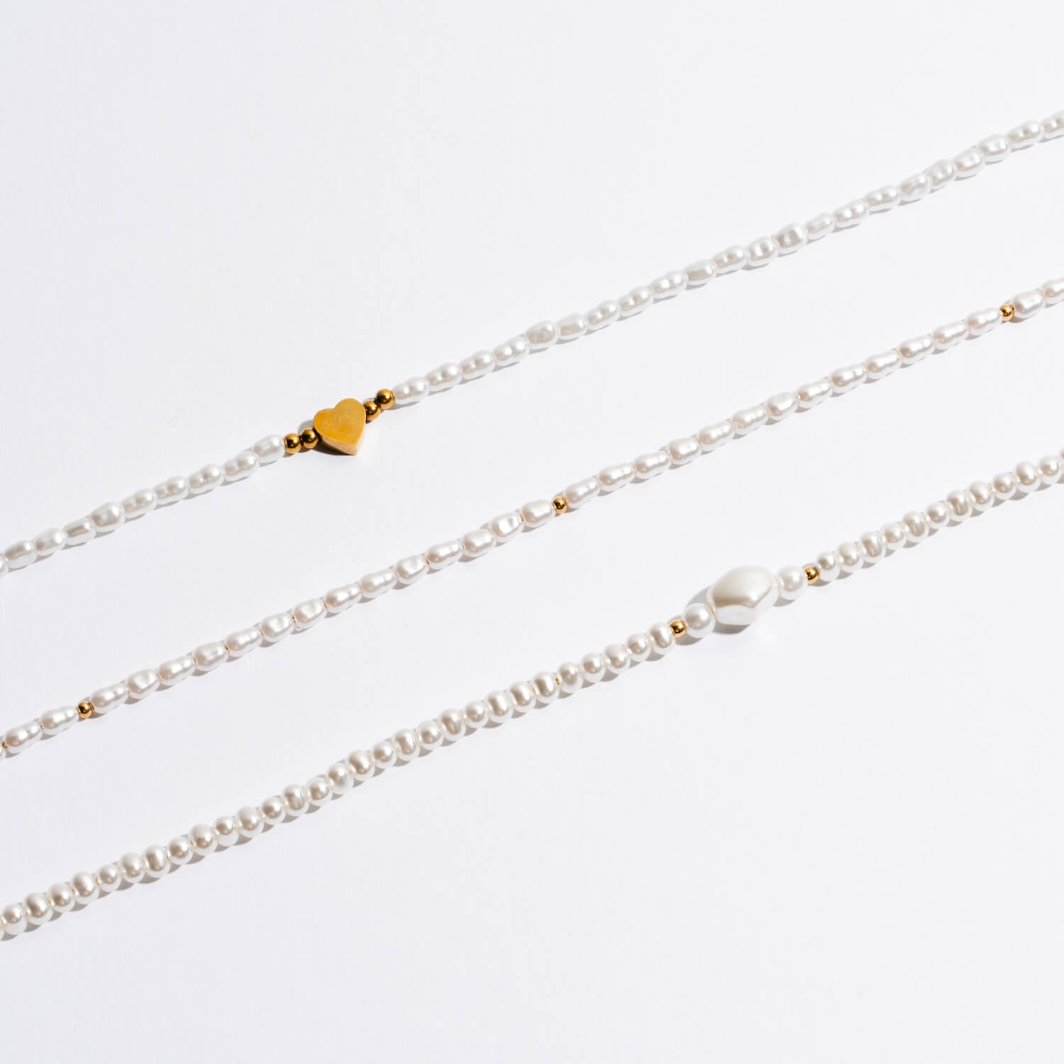 Colar Coração Pérolas e Aço Dourado